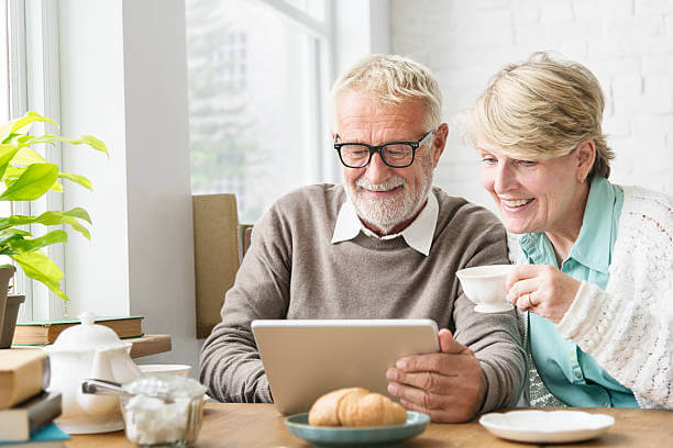 Senior Adult Using Digital Device Tablet Concept